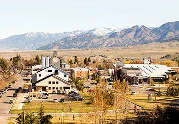 view of downtown Bozeman, Montana and the Bridger Mountains from the top of Peet's Hill
