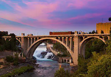 bridge over a river in Spokane, Washington at sunset