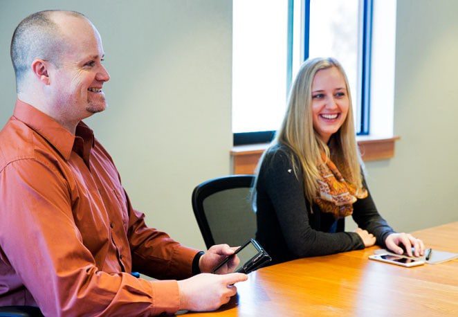 Drew Schug discussing SEO strategy with a client in Bozeman, MT