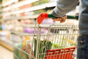 man pushing cart