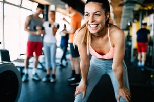 woman in gym smiling