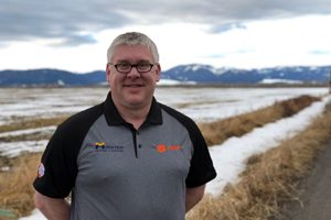 profile shot of man with mountains