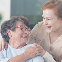 healthcare-seo-ppc-web-design woman smiling up at her nurse