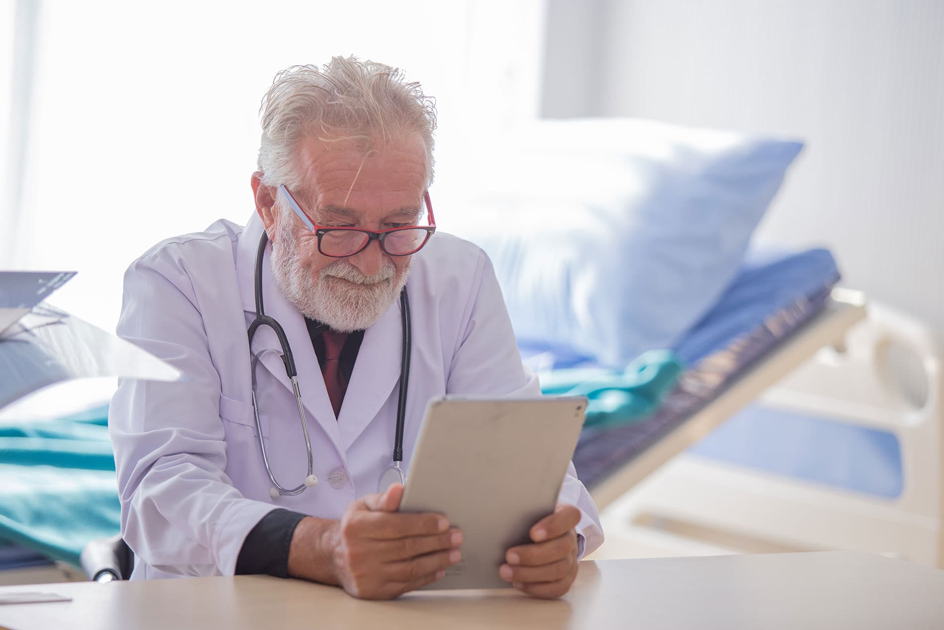 doctor looking at tablet